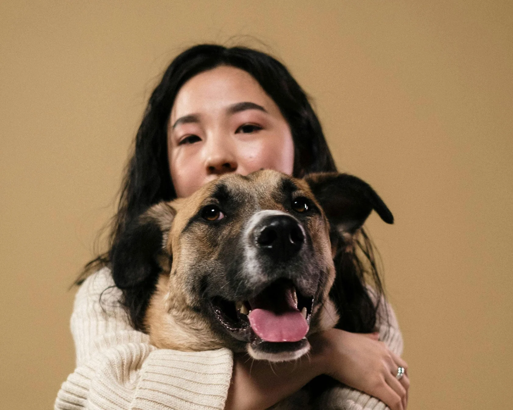 Woman hugging her dog