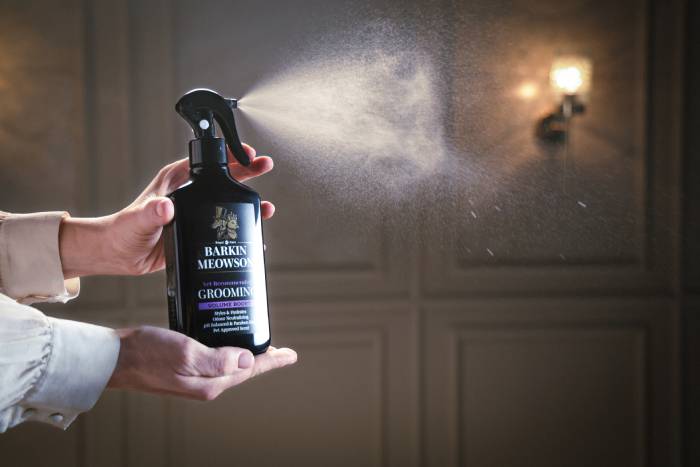 bottle of volume grooming spray for pets