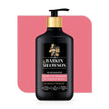 Barkin' Meowson shampoo bottle with gold pump on a pink background