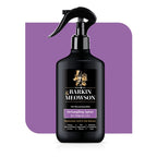 Black bottle of Barkin & Meawson detangling spray for pets on a purple background