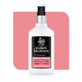 Spray bottle on white pink background