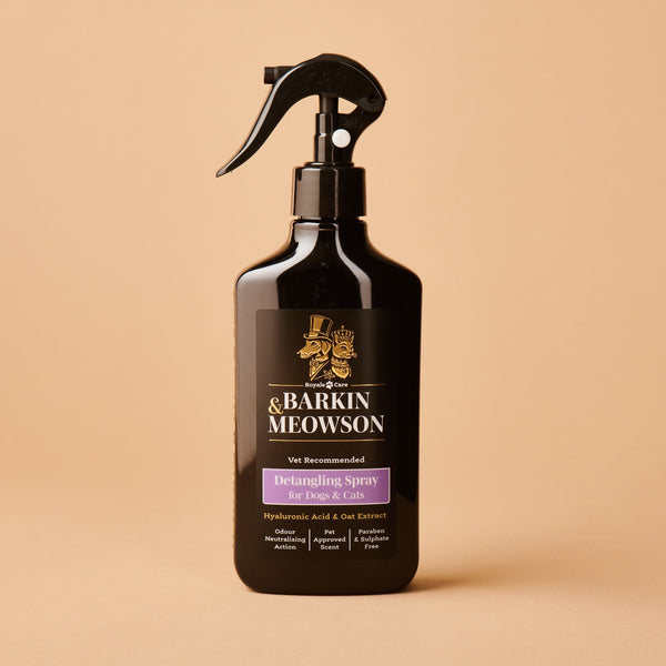 Barking & Meowson pet product spray bottle on a beige background