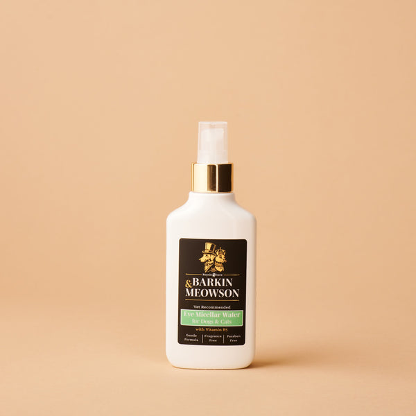 White spray bottle with a black label on a beige background