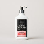 Barking & Meowson conditioner bottle on a light gray background