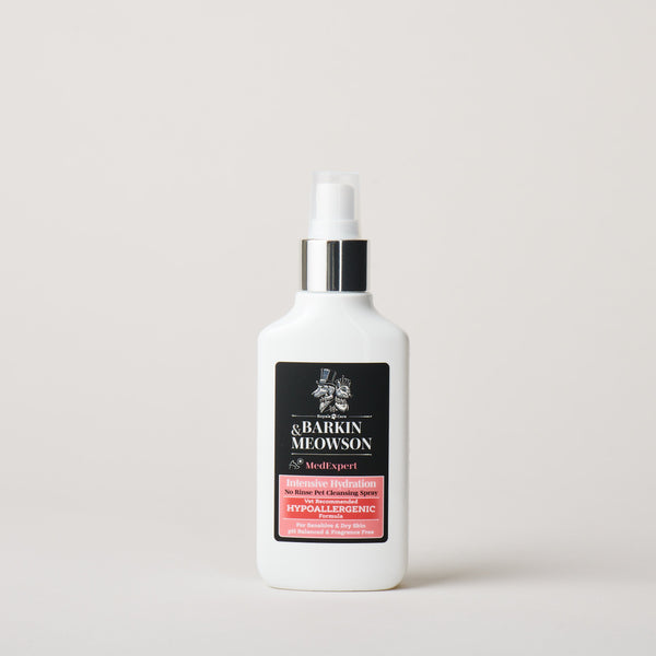 White bottle with a black label on a light gray background