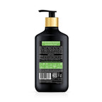 Black shampoo bottle with pump on a white background