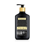 Black shampoo bottle with pump on a white background