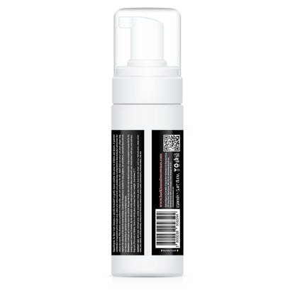 White foam bottle with black label on a white background