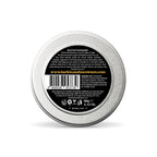 Back of a metal tin with a label on a white background