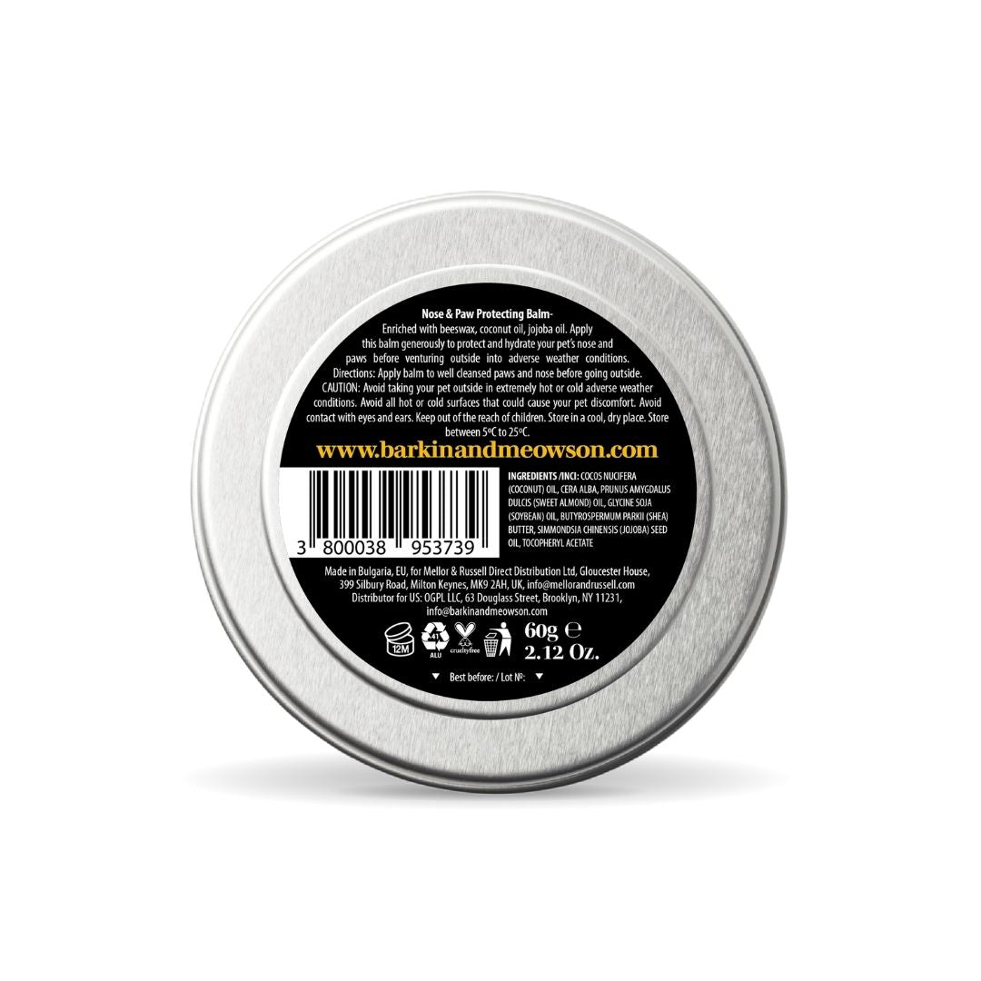 Back of a metal tin with a label on a white background