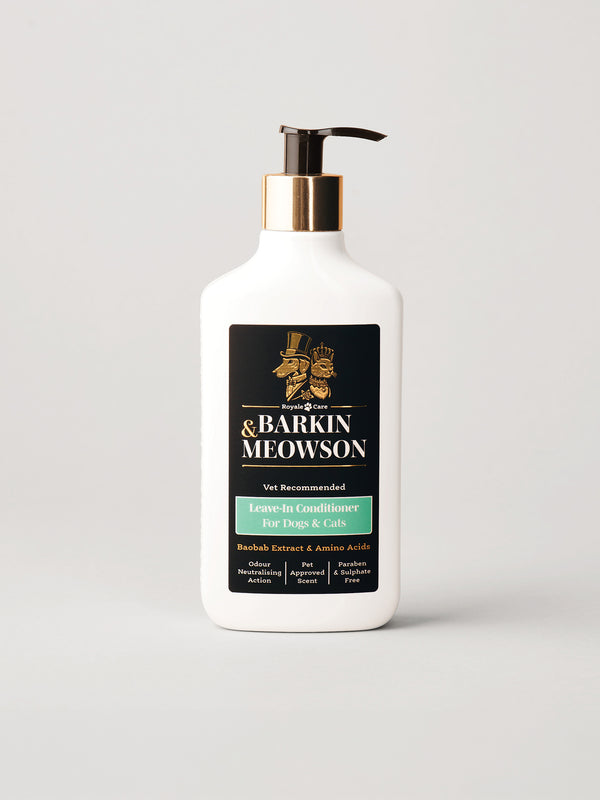 A white pump bottle of Barkin Meowson Vet Recommended Leave-In Conditioner for Dogs & Cats, featuring a black label with gold and green accents, set against a light gray background.