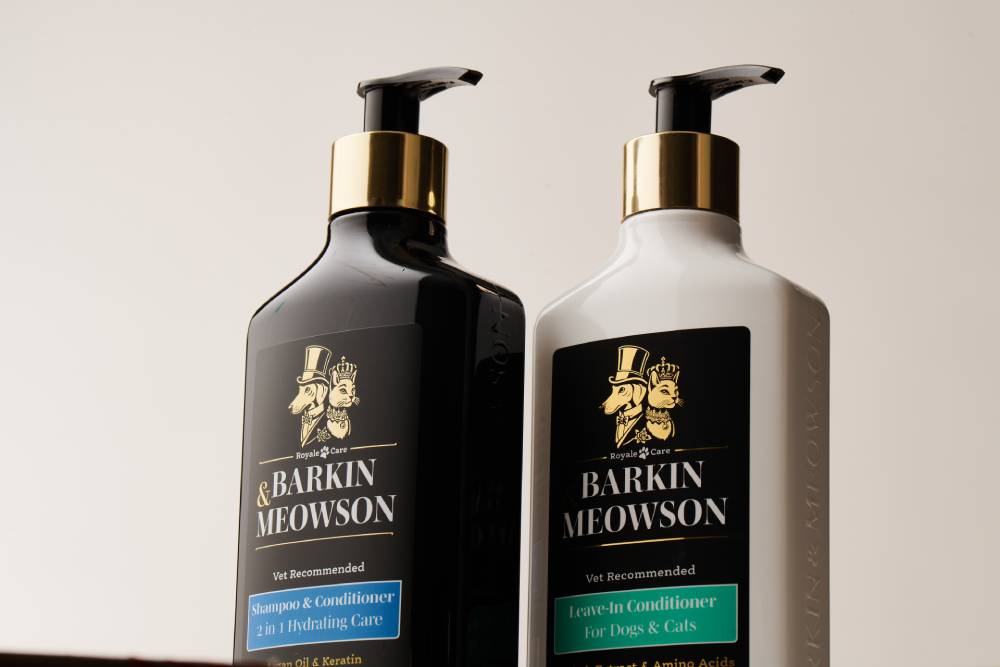 two bottles of pet conditioner